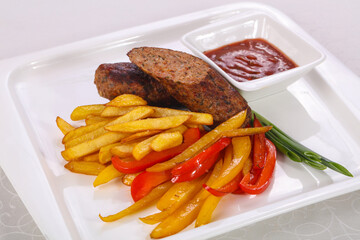 Roasted sausage with fried potato