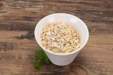 Raw oats in the bowl