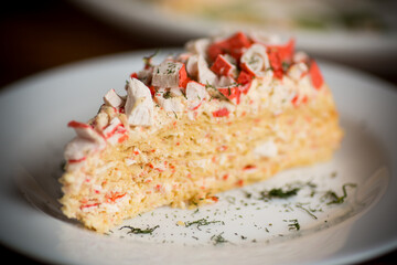 piece of snack cake stuffed with crab sticks in a plate