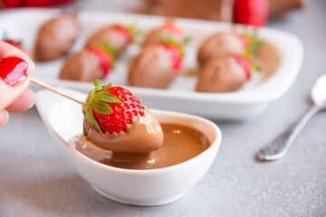 Strawberries with chocolate, delicious and gourmet dessert