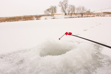 fishing with ice fishing rods  in the oles