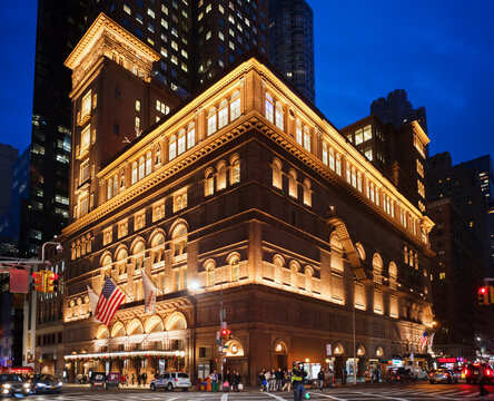 New York, New York, USA - December 11, 2015: Carnegie Hall in Manhattan in the evening. Located on the corner of 57th St. and 7th Ave., it is one of the most well known concert halls in the world.
