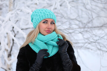 Young woman in a winter forest