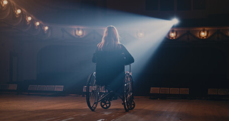 Handicapped actress leaving stage in theater