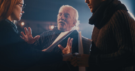 Man and woman playing romantic scene near director