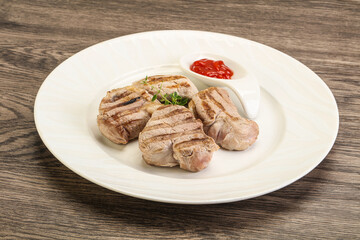 Grilled pork tenderlion with tomato sauce