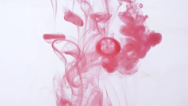 drop red ink paint in water slow motion