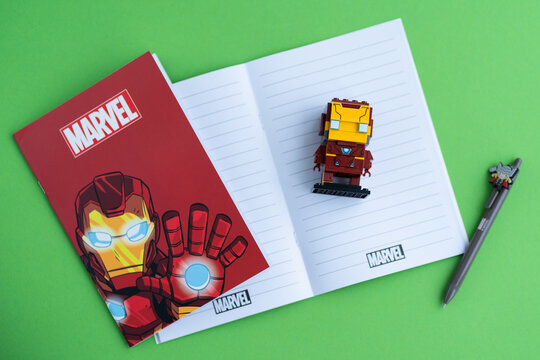 Minsk, Belarus. December, 2020. Lego Toy - Popular Super Heroes Marvel. Iron Man. Notebooks, copybook, pen, constructor. Education and school background.