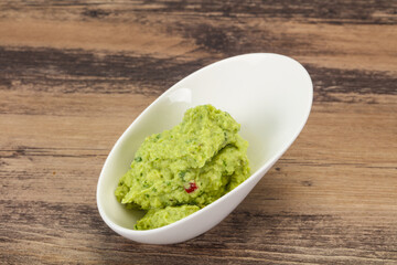 Avocado guacamole sauce with chili pepper