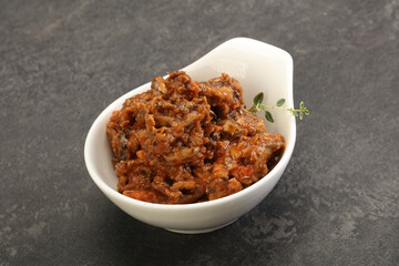 Canned anchovy in tomato sauce