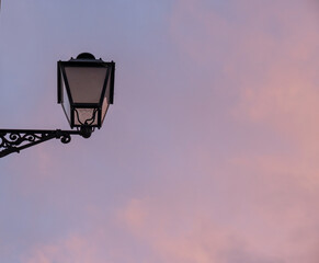 BEAUTIFUL LANDLAMP ALONE IN THE PICTURE WITH A BEAUTIFUL SKY AT SUNSET