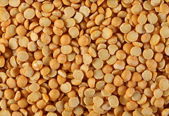 Yellow split peas background and texture, top view