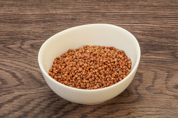 Raw buсkwheat cereal in the bowl