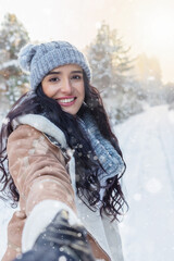 beautiful young woman in fabulous winter forest