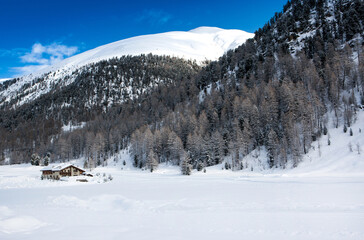 Fototapeta na wymiar Beautiful winter landscape of the Dolomites mountains in northeastern Italy