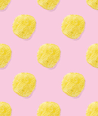 Seamless pattern made from Potato chips on pink background flat lay. potato snack chips isolated Fast food banner.