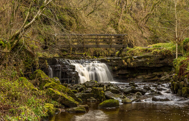 Fototapeta na wymiar Ash Gill near Alston in Cumbria, is located in an area of outstanding natural beauty close to the Lake District National Park, is a beautiful stretch of water with many picturesque waterfalls