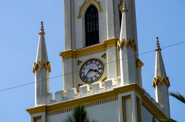 the clock of a church in India