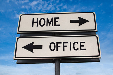 Home versus office road sign. White two street signs with arrow on metal pole with word....