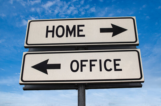 Home versus office road sign. White two street signs with arrow on metal pole with word. Directional road. Crossroads Road Sign, Two Arrow. Blue sky background. Two way road sign with text.