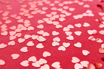 Valentine's Day background. Hearts on red background. Valentine day concept. Top view, flat lay