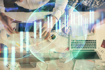 Double exposure of man and woman working together and financial chart hologram drawing. market analysis concept. Computer background. Top View.