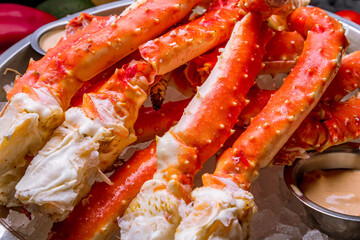 King crab claws on wooden table © bbivirys