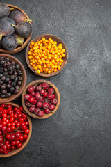 top view different fresh fruits inside plates on a dark background many fruit color photo mellow