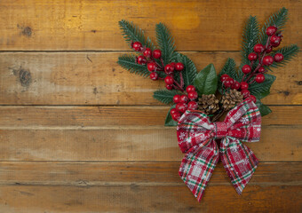Christmas rustic background - vintage planked wood with Christmas fir tree and free text space. top view