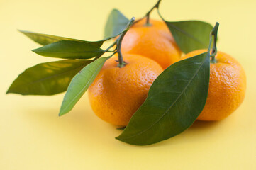 Orange fruit withleaves isolated on white background.