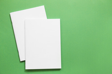 Blank magazines on color background