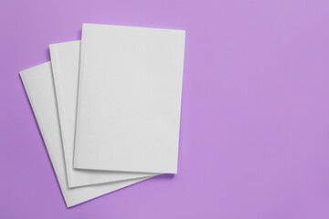 Blank magazines on color background