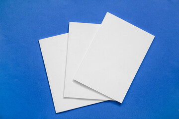 Blank magazines on color background