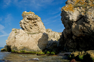 Fototapeta na wymiar Whimsical grottoes form rocks on the shores of the Azov Sea.