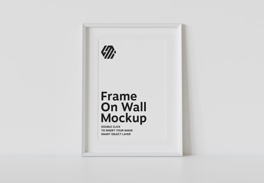 White Frame Leaning on Wall Mockup