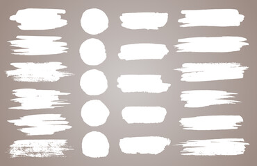 Set of white ink stains. black paint, ink brush stroke, brush, line or round texture. Dirty artistic design element, box, frame or background for text.