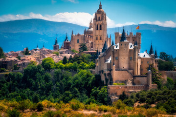 Fototapeta na wymiar City of Segovia with a view of the Alcazar castle, cathedral and small houses around. 