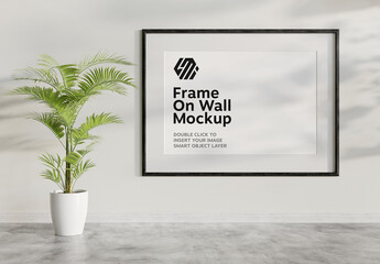 Black Frame Hanging on Concrete Interior Mockup