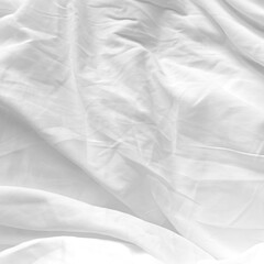Crumpled Bed Cotton Sheet Material. White Fabric Isolated Macro Texture. Messy Linen Drapery In Bedroom Close-up.