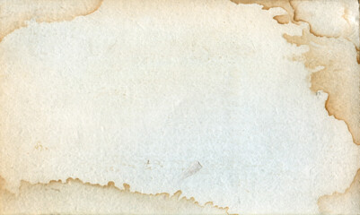 Texture of an old paper with water stains as a background