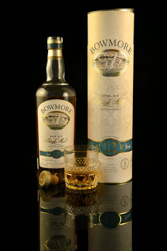 Bowmore Single Islay Malt Scotch whisky on black background. Whisky is a major export item of Scotland - illustrative editorial, Scotland, UK