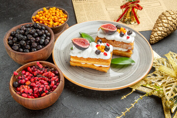 front view delicious waffle cakes with fruits on dark background sweet cake photo cream dessert