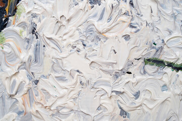 Macro. Abstract art. Expressive embossed pasty oil paints and reliefs. Colors: white.