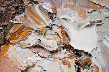 Macro. Abstract art. Expressive embossed pasty oil paints and reliefs. Colors: white, beige, brown.