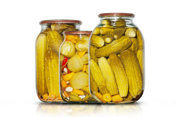  pickled vegetables in glass jars isolated on white background