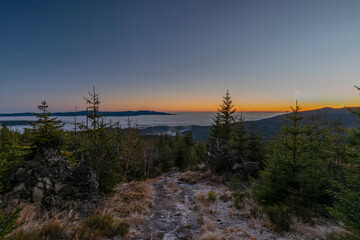 Sunrise on Plechy hill in winter sunny cold morning