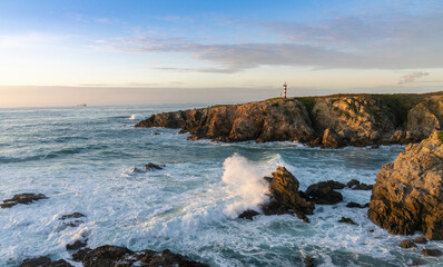 view of the Porto Covo lighthouse at sunset