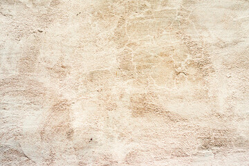 Texture of a concrete wall with cracks and scratches which can be used as a background