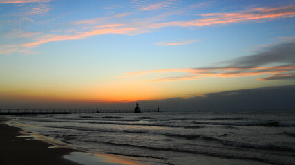 Fototapeta na wymiar St. Joseph Michigan lighthouse at sunset