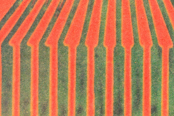 Red and green striped retro background. Paper texture.